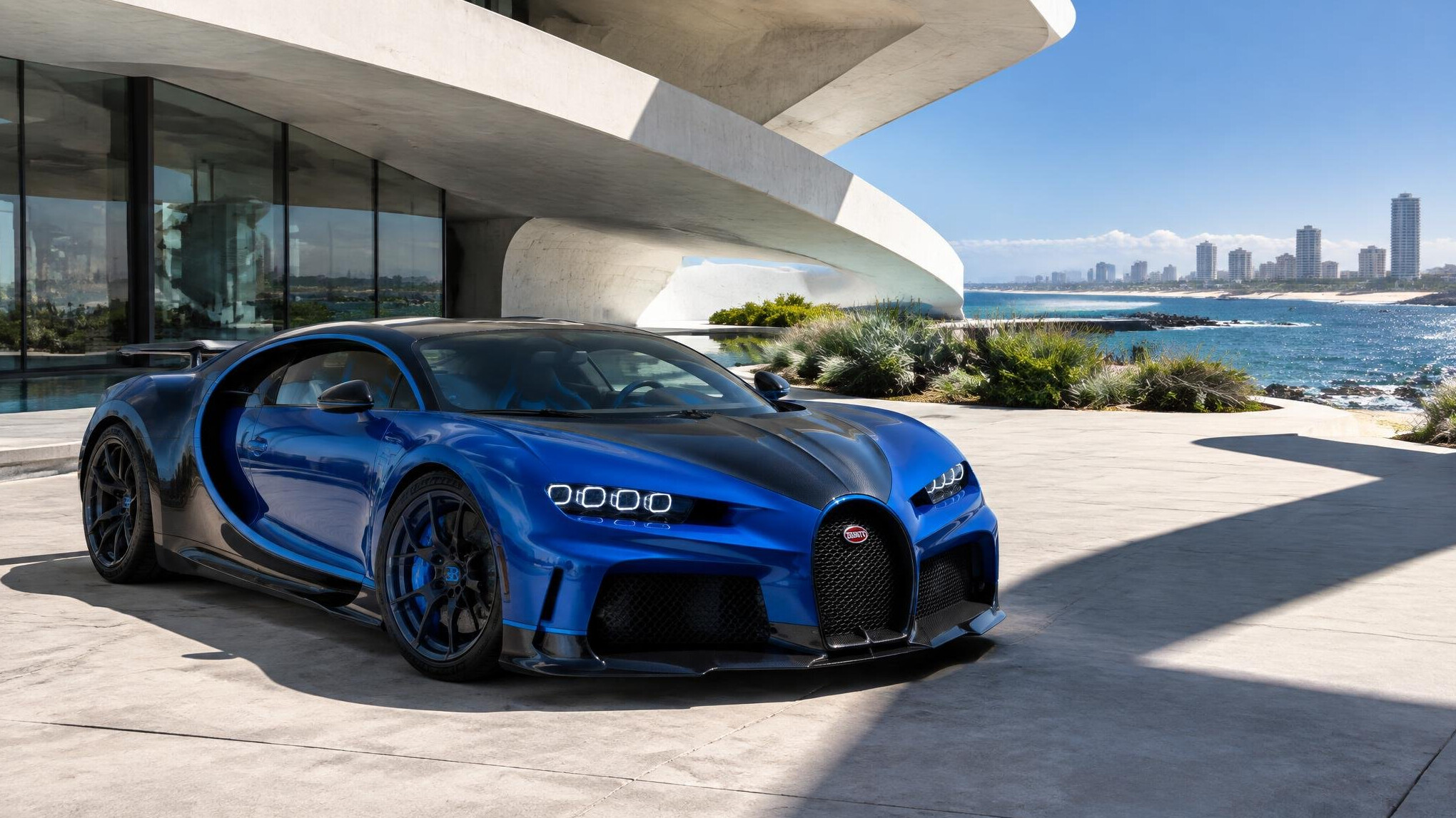 Exotic Bugatti parked near a modern building in Punta del Este